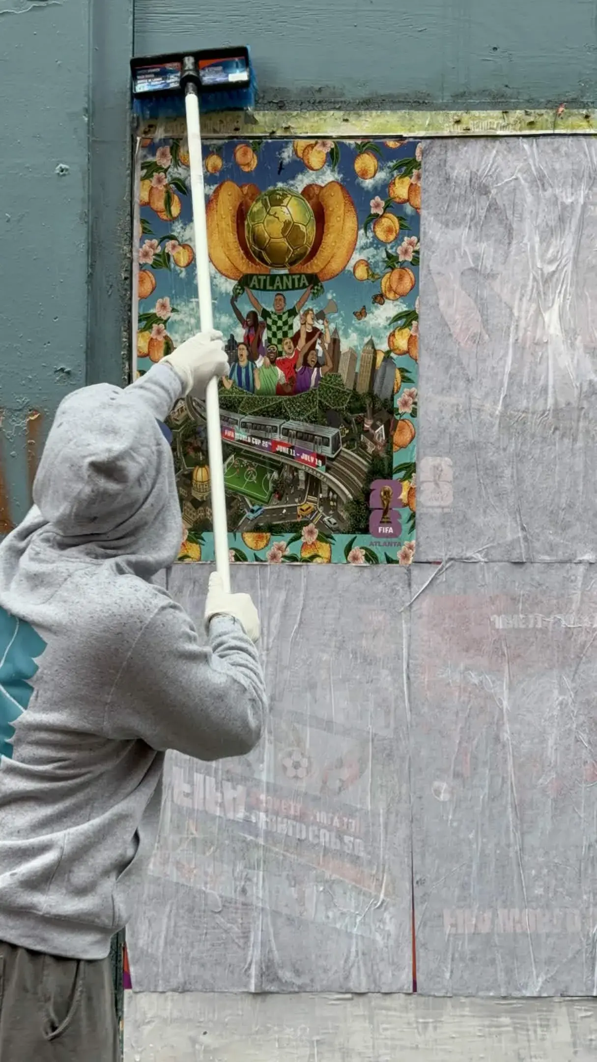 FIFA World Cup poster installation closeup